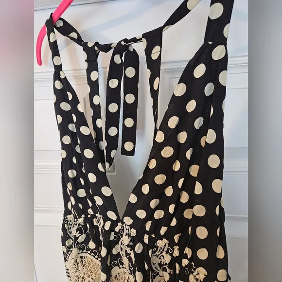 Free people top size XS. Black w cream Polkadots.          A - Picture 6 of 6